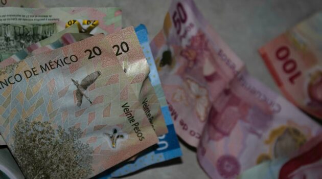 Residency Rules for Expats Mexico Pesos Marco Antonio Casique Reyes Unsplash
